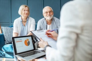 An investment fraud lawyer explains FINRA Rule 4530 Reporting Requirements to an elderly couple who are investors.